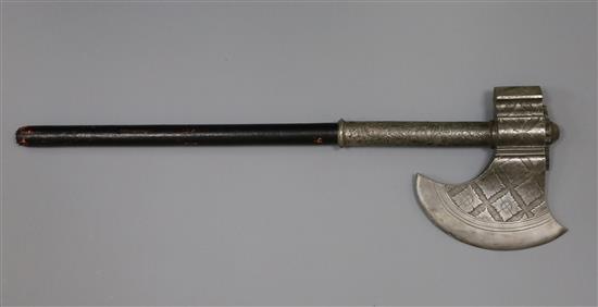 A Sikh silver foiled steel axe head, Tabarzin - Punjab early 19th century, length 26in., axe head 10.5in.